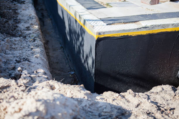 Professional Waterproofing technician working in Vandalia, IL